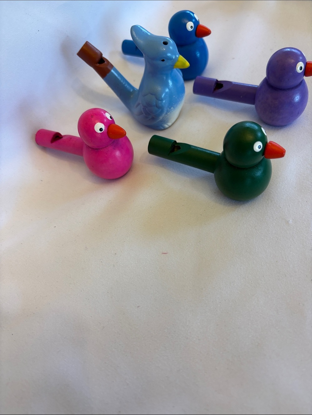 SET OF 4 COLORFUL WOODEN WHISTLES BLUE,GREEN ,PURPLE ,PINK &1 BLUE CLAY WHISTLE - Picture 3 of 8